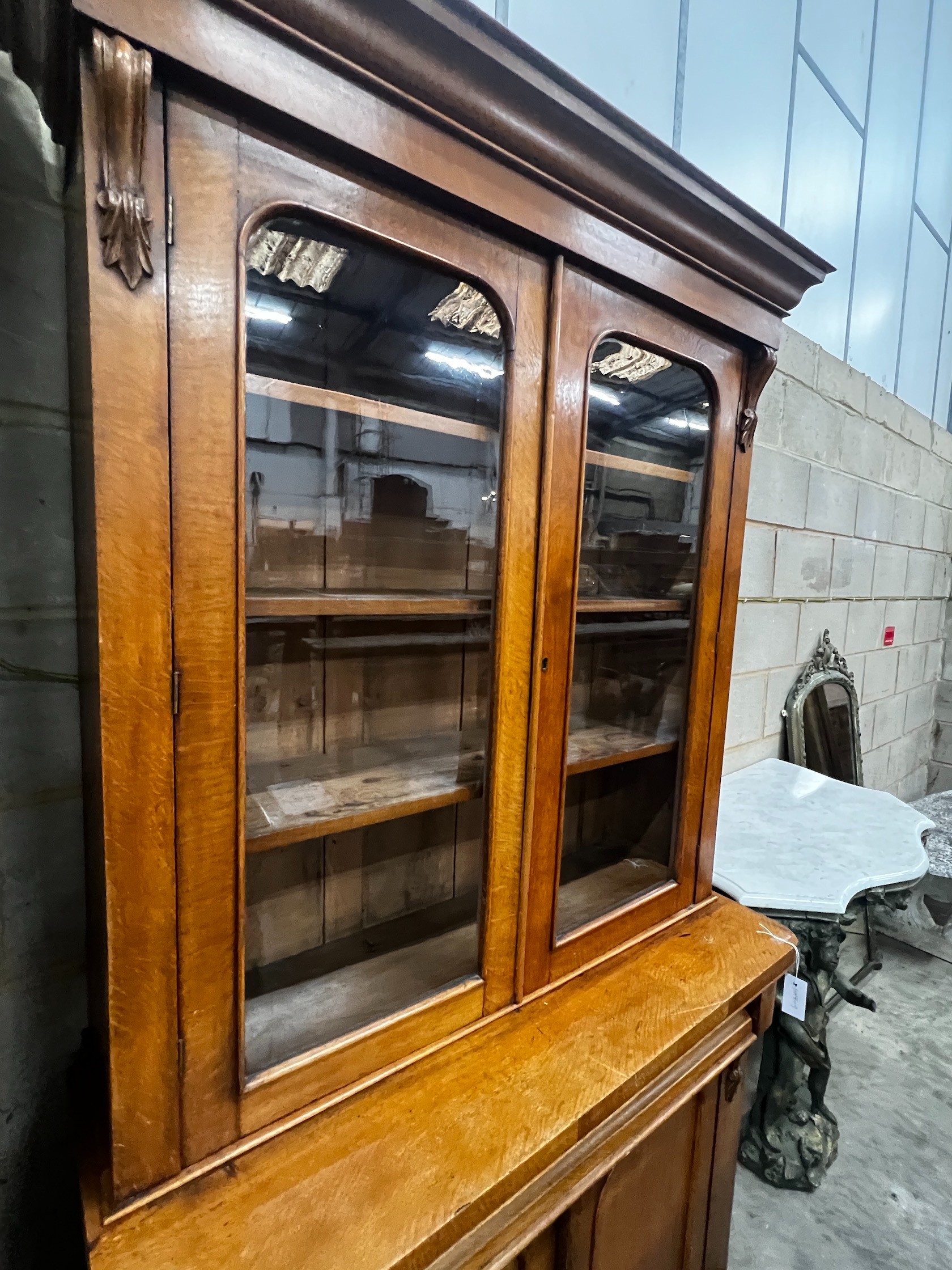 A Victorian oak bookcase cupboard, width 104cm, depth 42cm, height 200cm
